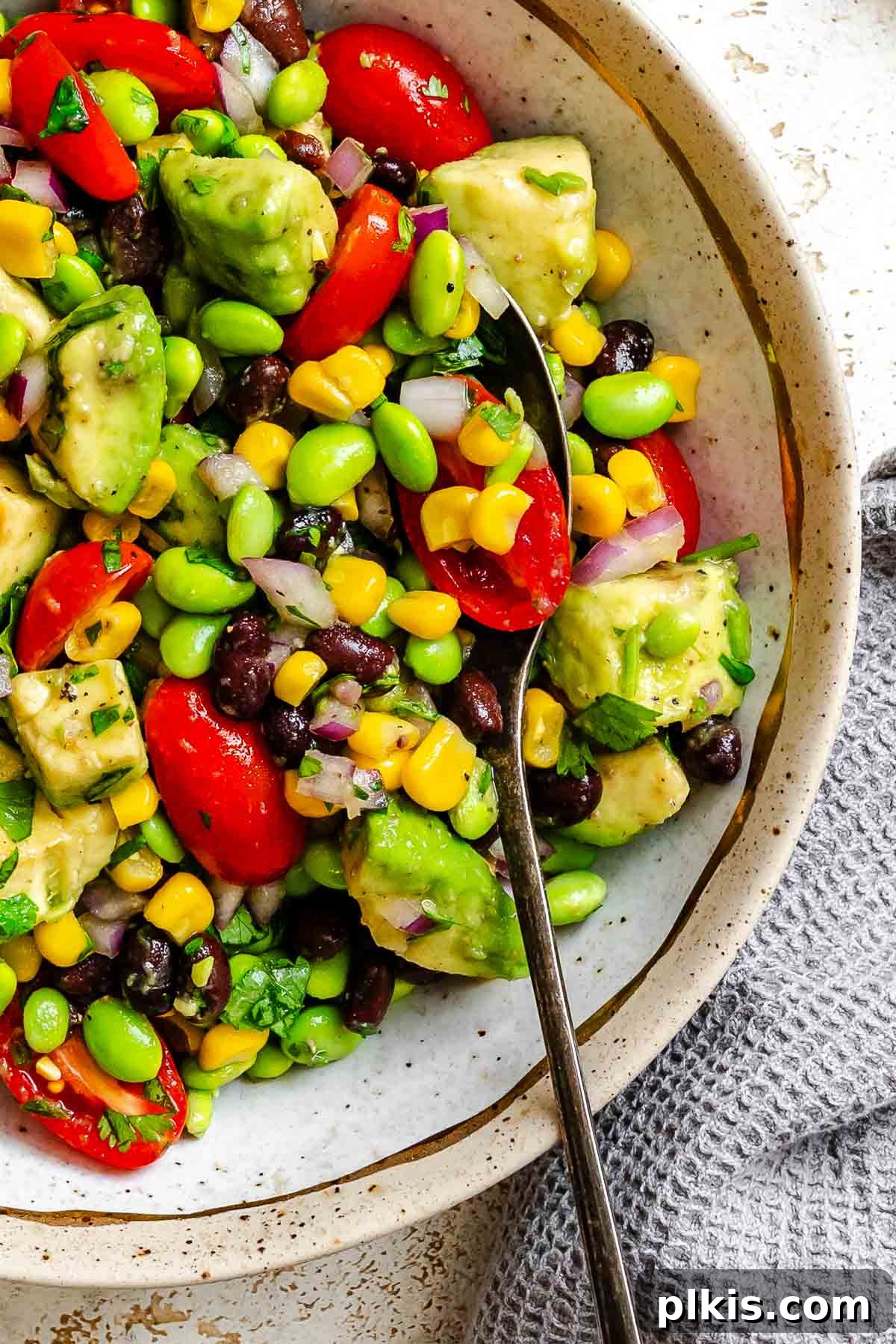 Vibrant Edamame Corn and Black Bean Salad 2 Completed Edamame Salad (With Corn and Black Beans) in a bowl, showcasing its vibrant colors and fresh ingredients.