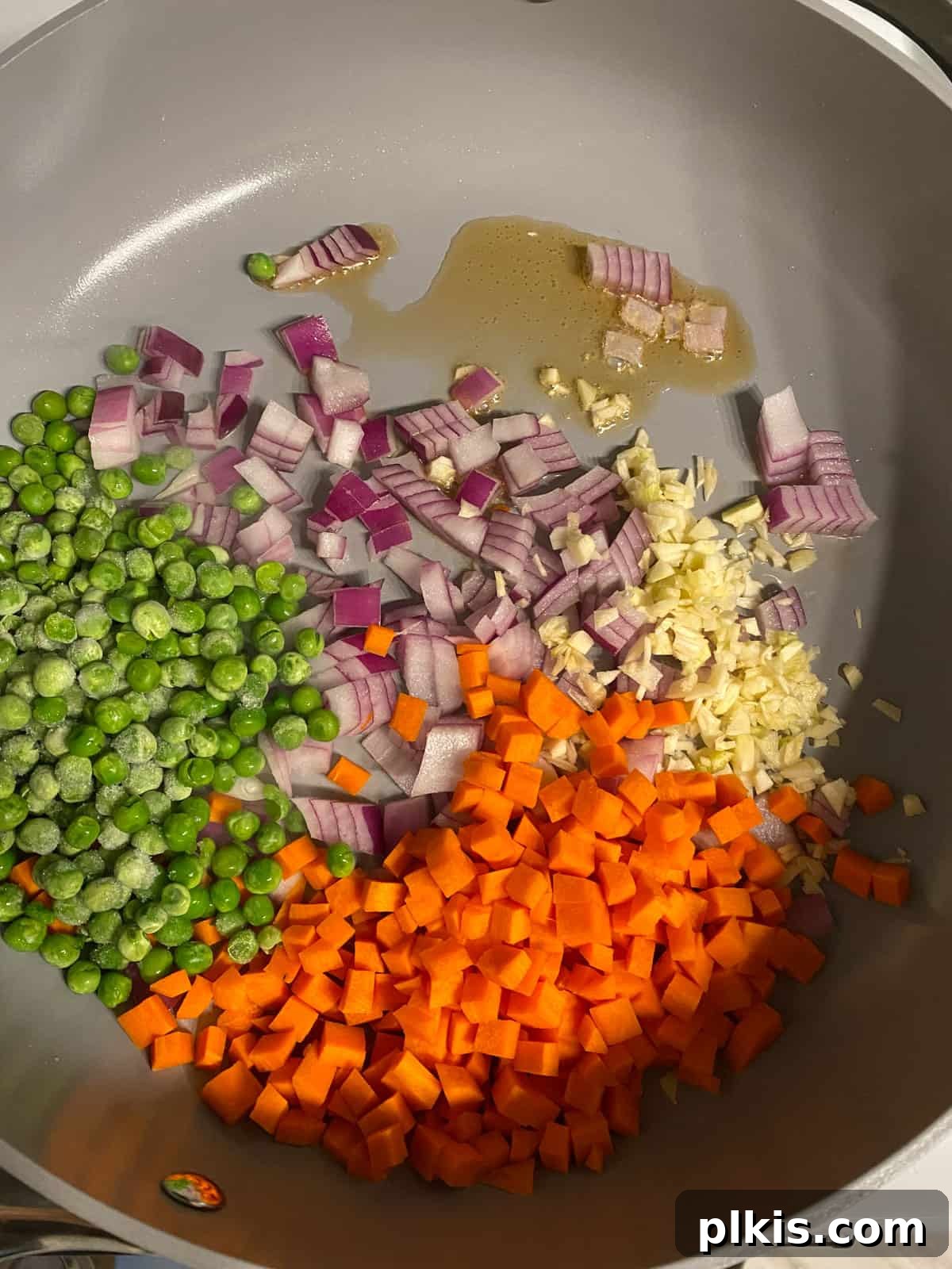 Quick Veggie Brown Rice Stir-Fry 4 ingredients for Easy Vegetable Brown Fried Rice added to a pan