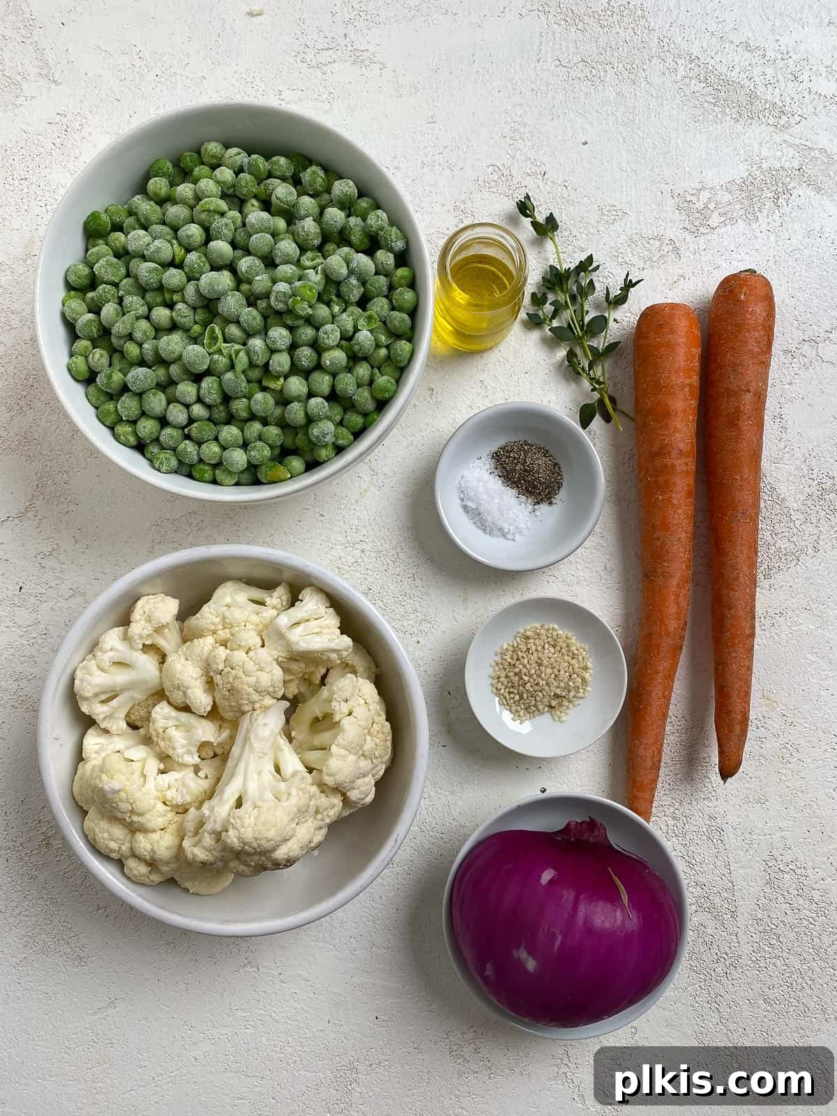 Effortless Creamy Peas with Golden Roasted Vegetables 3 ingredients for Easy Mushy Peas with Roasted Veggies against a light background