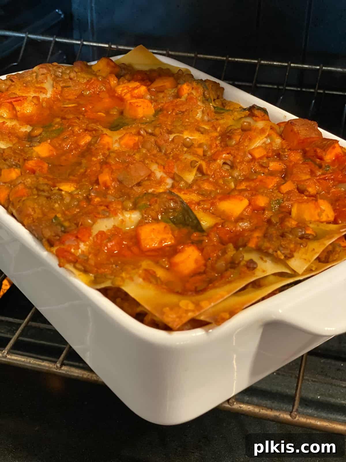 Deliciously Easy Vegan Sweet Potato Lasagna 16 process shot of adding lasagna to stove