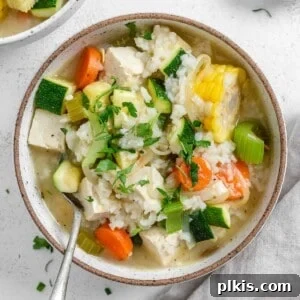 completed Caldo de Tofu in a bowl against a white surface