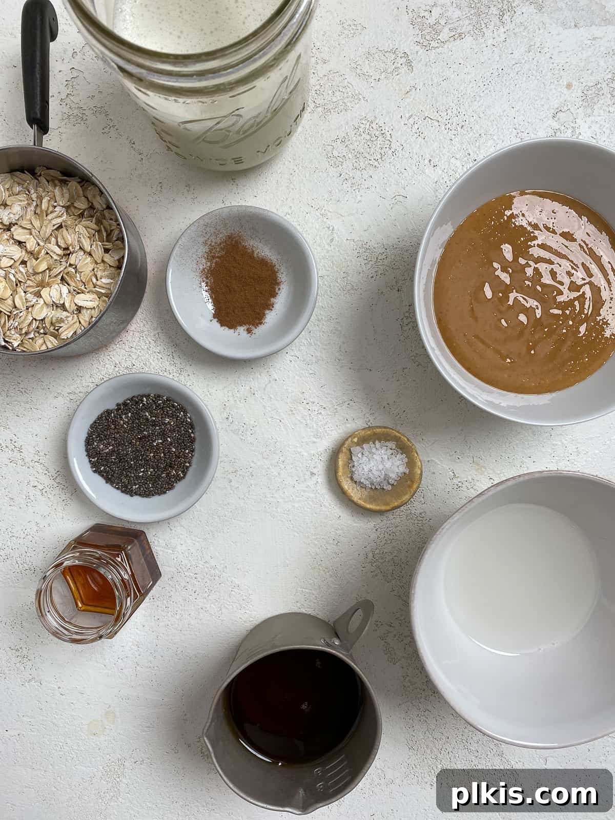 Decadent Salted Caramel Overnight Oats 3 ingredients for Salted Caramel Overnight Oats measured out against a white background