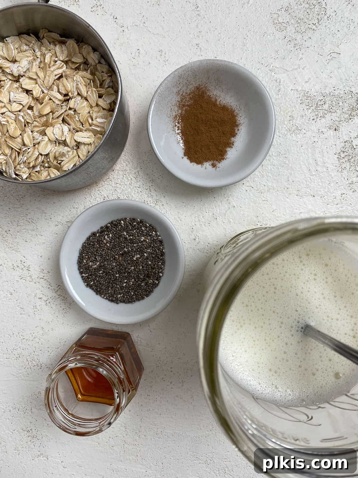 Decadent Salted Caramel Overnight Oats 4 ingredients for Salted Caramel Overnight Oats measured out against a white background