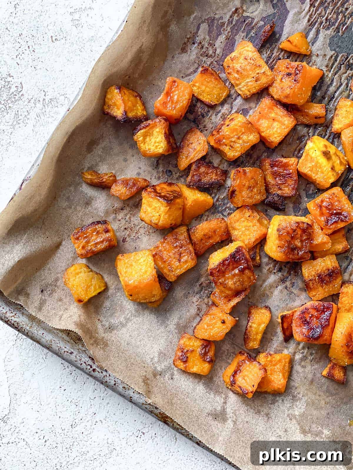 Roasted Pumpkin Harvest Salad 6 post baked pumpkin on baking pan