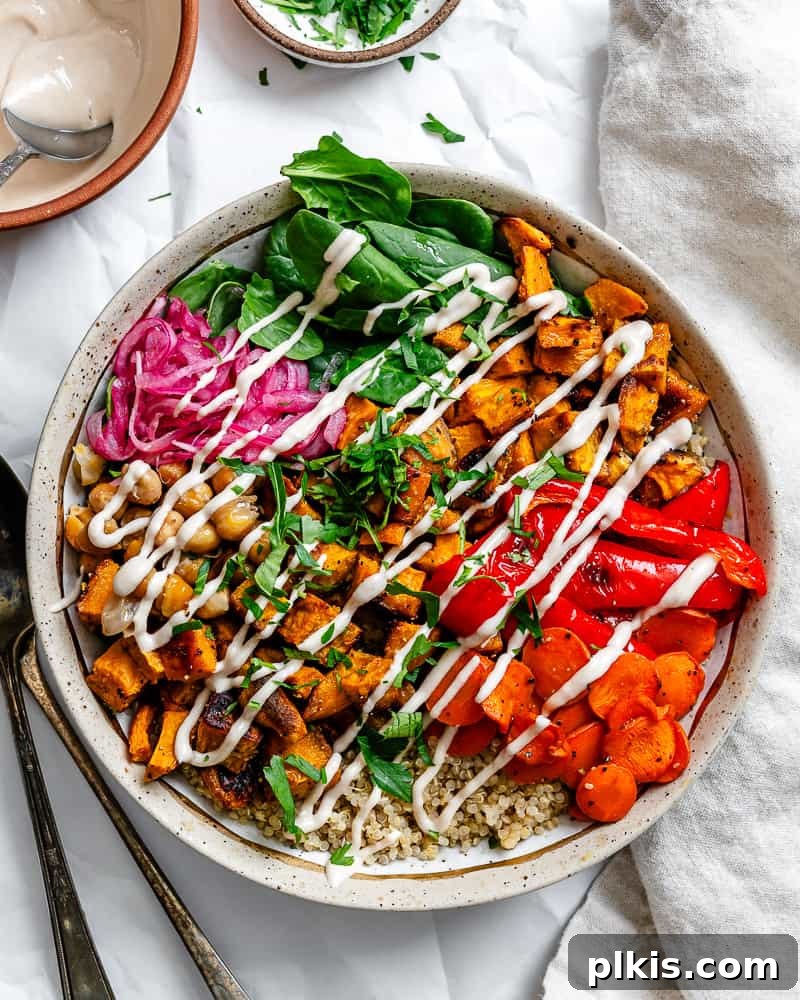 Roasted Sweet Potato Quinoa Power Bowl 19 A beautifully completed Sweet Potato Quinoa Bowl, overflowing with vibrant colors and textures, ready to be savored.