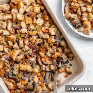 Simple & Savory Mushroom Stuffing 15 completed Easy Mushroom Stuffing Recipe in dish alongside a plated serving