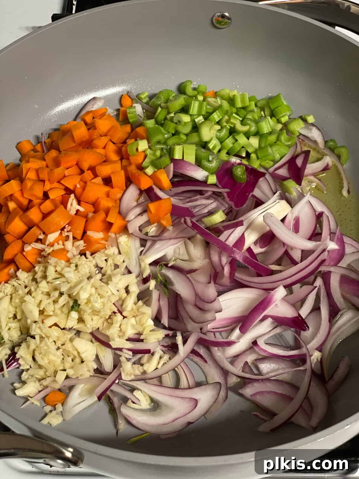 Simple & Savory Mushroom Stuffing 5 process of cooking veggies in a pan