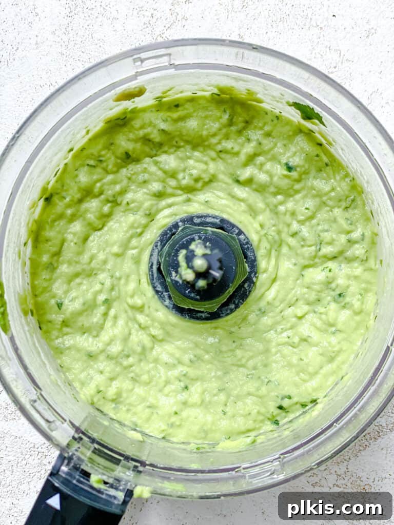 Instant Mexican Avocado Crema 6 Post-processing of ingredients in a food processor, showing smooth avocado crema