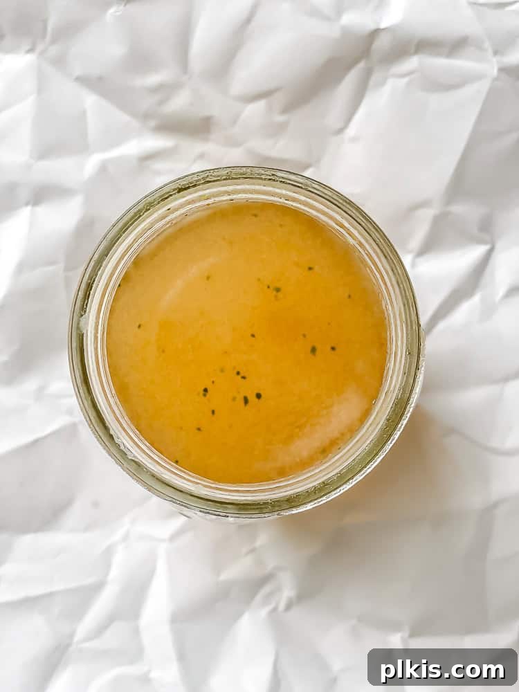 Southern Comfort Reimagined Vegan 11 Process shot showing bouillon cube dissolving in hot water to create a broth.