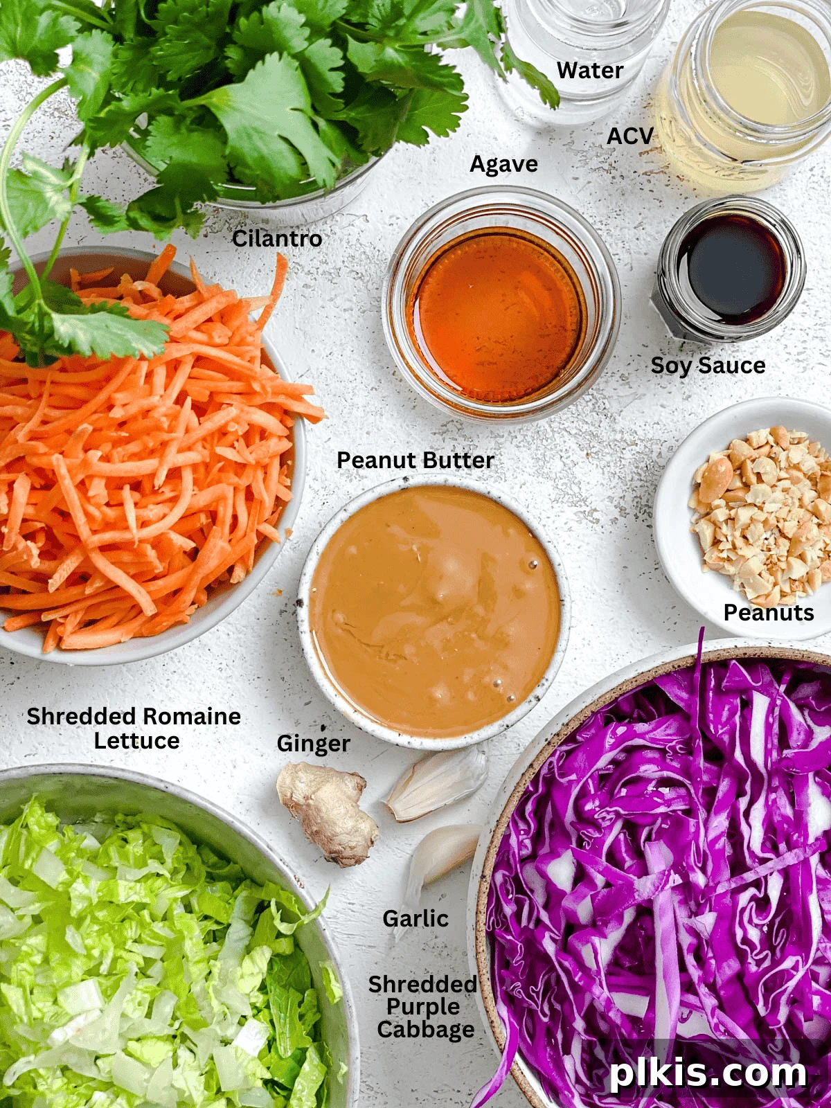 Zesty Thai Peanut Salad 3 A close-up shot of the raw ingredients for Crunchy Thai Peanut Salad, showcasing fresh vegetables like shredded cabbage and carrots, ready to be combined.