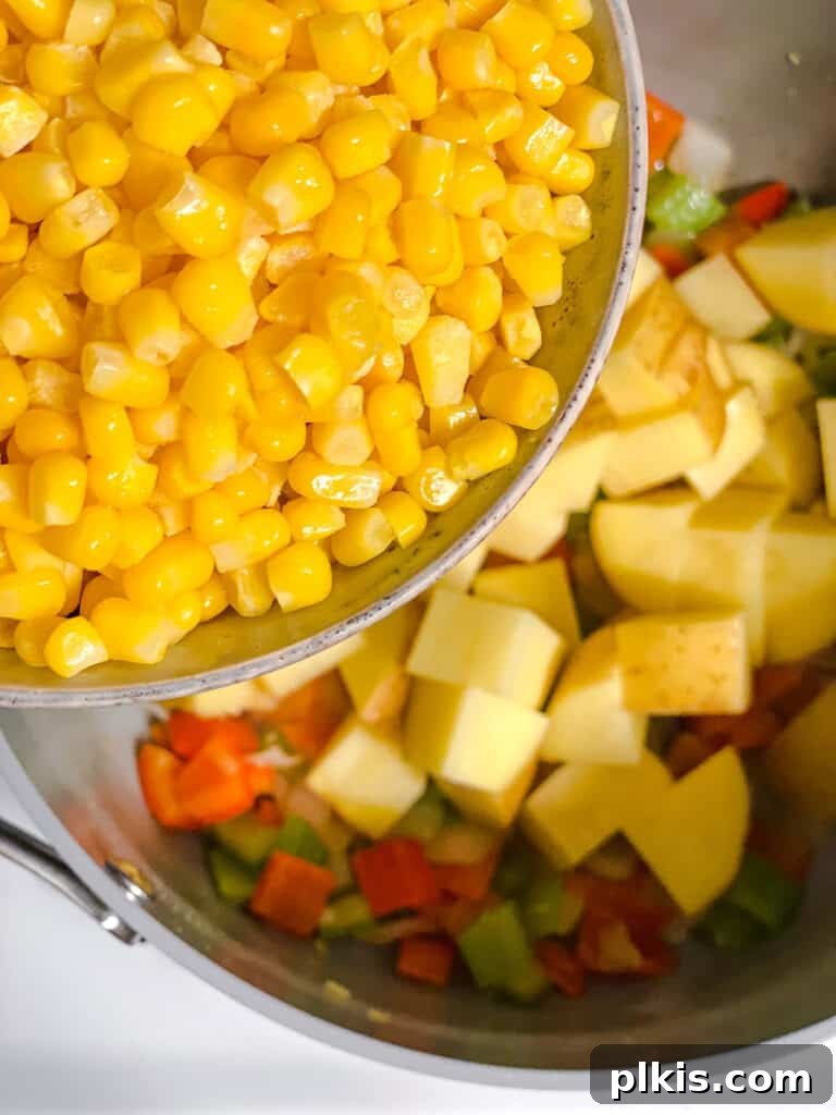Golden Harvest Chowder 7 process shot of adding corn to pot