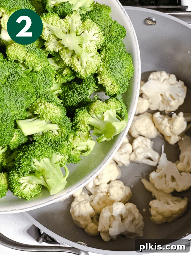 Christmas Tree Veggie Tray 5 Step-by-step image of adding broccoli to a pot for steaming.