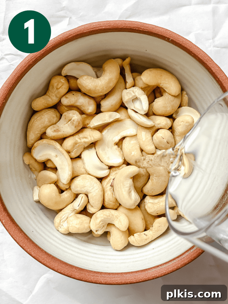 Whip Up Your Own Cashew Milk 4 process shot of adding water to cashews for soaking