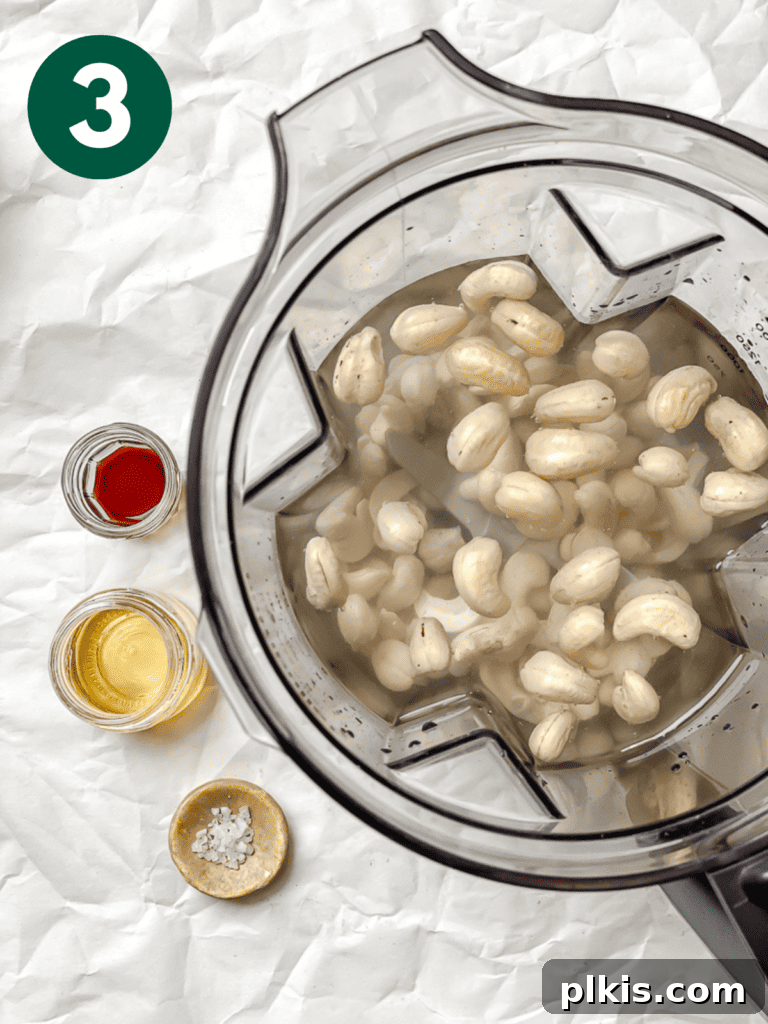 Whip Up Your Own Cashew Milk 6 process shot showing cashews in blender alongside water, sweetener, and vanilla