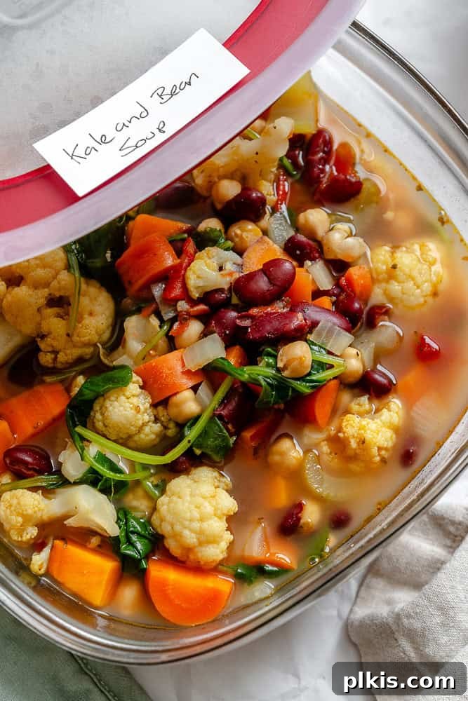 Nourishing Kale and Bean Harvest Soup 8 completed Kale Vegetable Bean Soup in a storage container