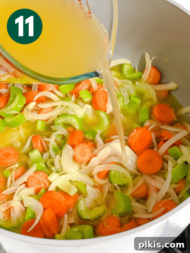 Comforting Vegan Matzo Ball Soup 14 process shot showing adding broth to veggies
