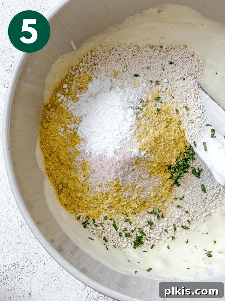 Comforting Vegan Matzo Ball Soup 8 process shot showing mixing ingredients in bowl