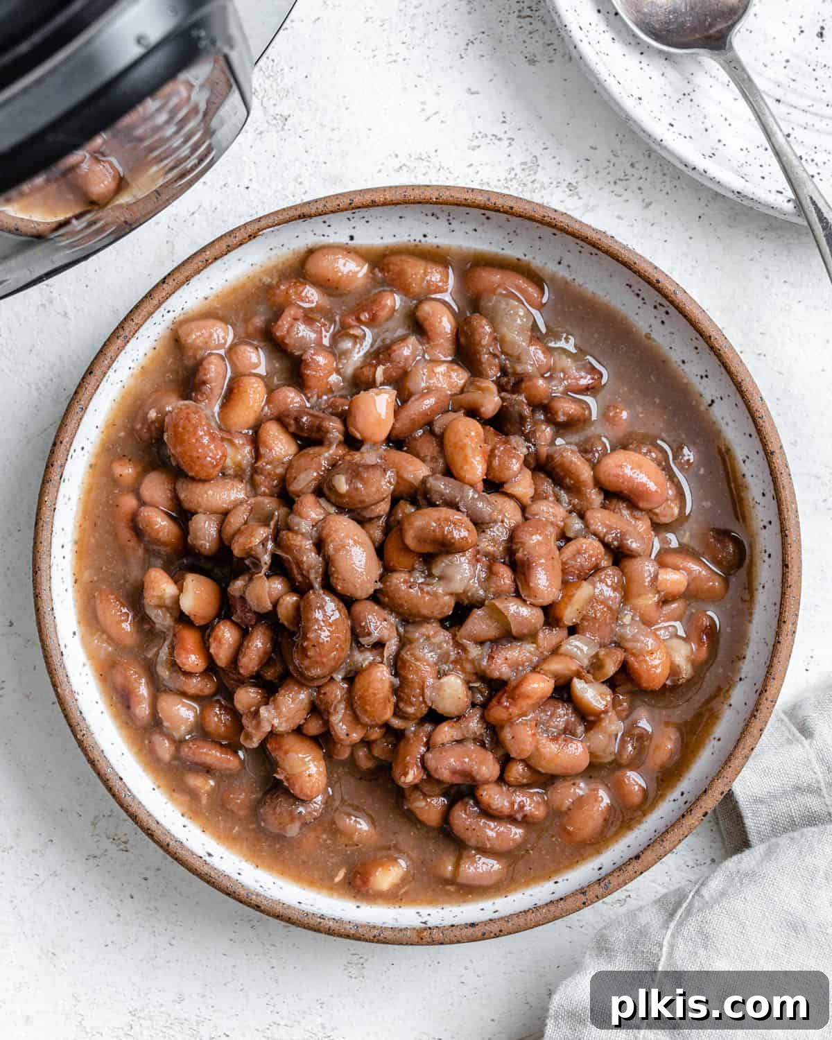 Perfectly Cooked Instant Pot Pinto Beans 2 completed Instant Pot Pinto Beans in a bowl