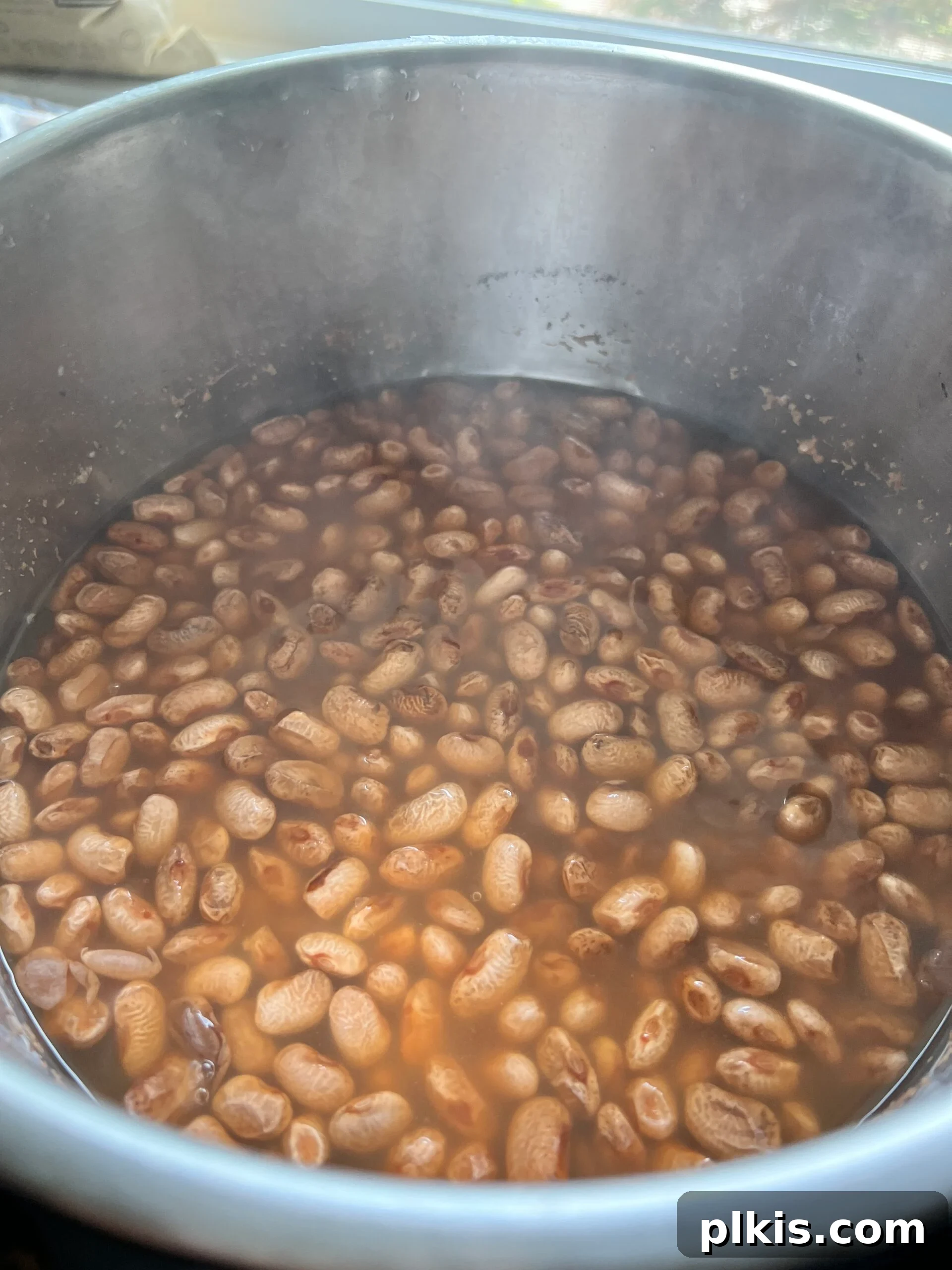 Perfectly Cooked Instant Pot Pinto Beans 10 process shot showing beans in instant pot