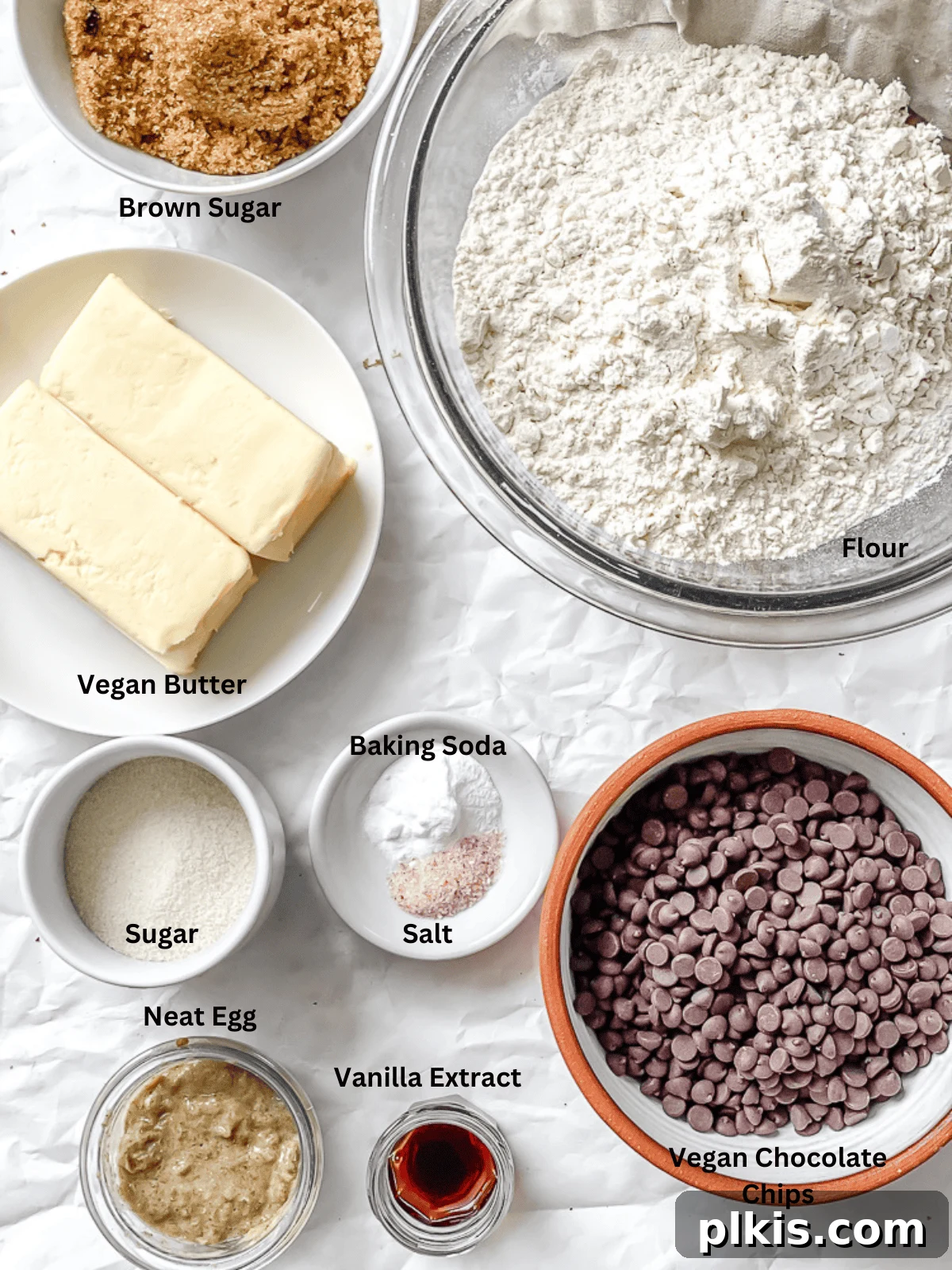 Treasure Trove Cookies 3 Ingredients for Vegan Kitchen Sink Cookies laid out on a white surface