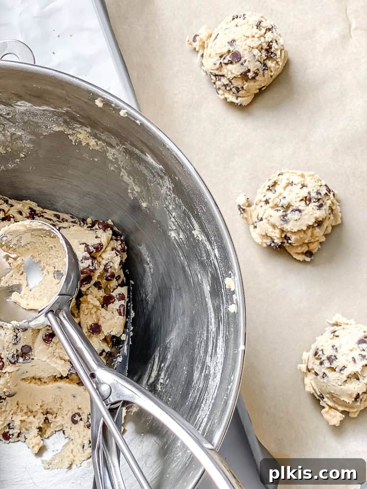 Treasure Trove Cookies 7 Process shot showing cookie dough scooped onto a baking sheet