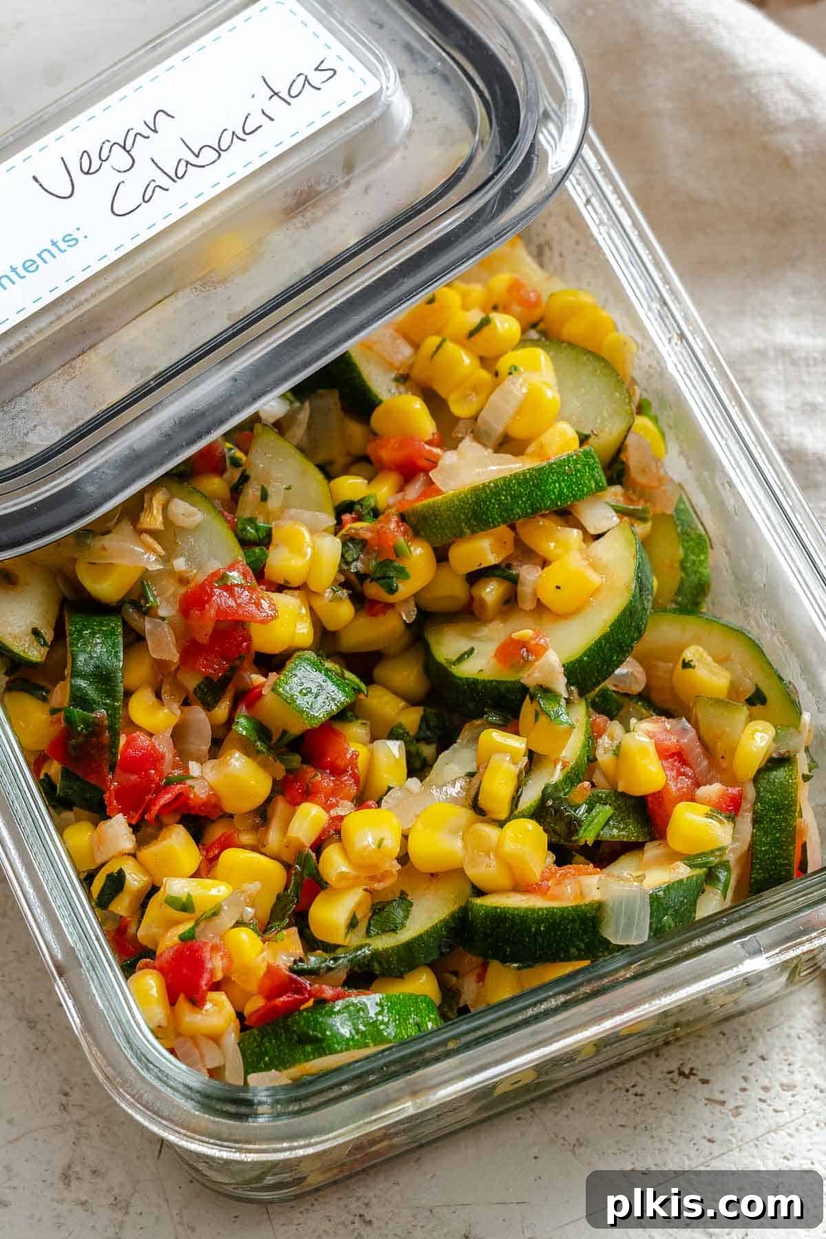 Effortless Calabacitas: A Mexican Zucchini Delight 8 Completed Easy Calabacitas Recipe (Mexican Zucchini) in a storage container.