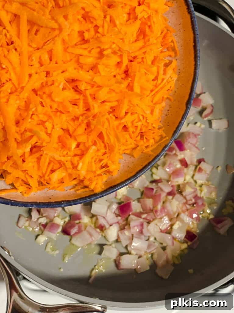 Roasted Sweet Potato and Black Bean Burritos 7 process shot of adding sweet potato to pan