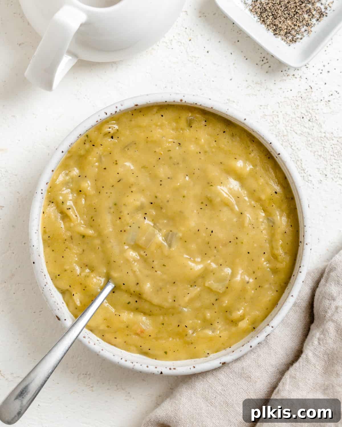 Effortless Plant-Based Gravy 2 A bowl of rich, homemade Easy Vegan Gravy, ready to be served over holiday dishes.