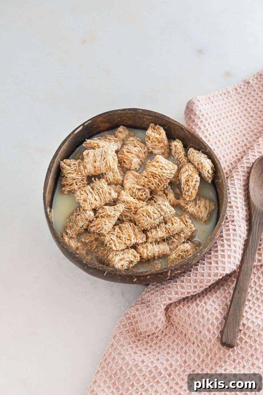 Solo Plant-Based Budget Challenge: Week 1 5 Bowl of shredded wheat cereal with milk.