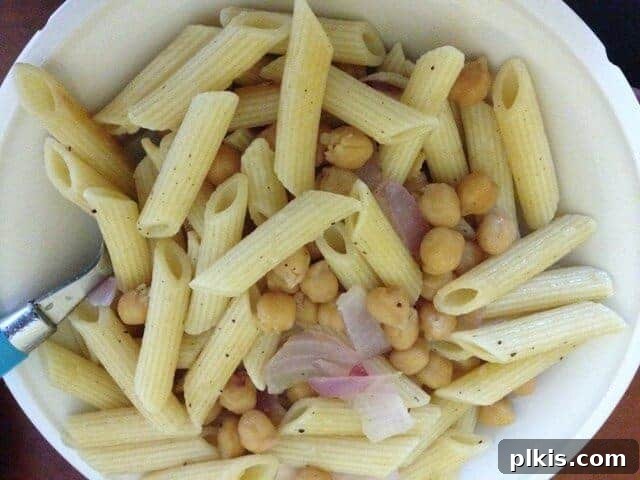 Frugal Vegan Feasts for One: Week 2 Progress 13 Chickpea penne pasta salad in a white bowl.