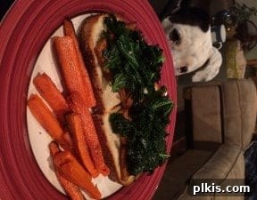 Plant-Based Budget Challenge for Two: Week 3 7 An open faced tofu and kale sandwich with a side of roasted carrots on a plate.