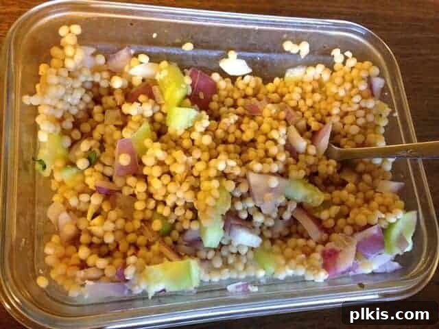My Solo Budget Vegan Journey: Week 4 3 Glass container filled with Israeli couscous salad.