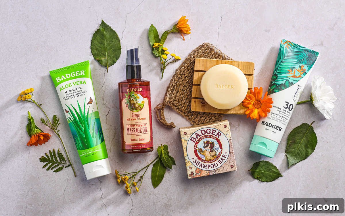 Holiday Gifting Unwrapped Your Essential Picks 12 A selection of natural Badger Balm products displayed on a light grey surface, highlighting their organic appeal.