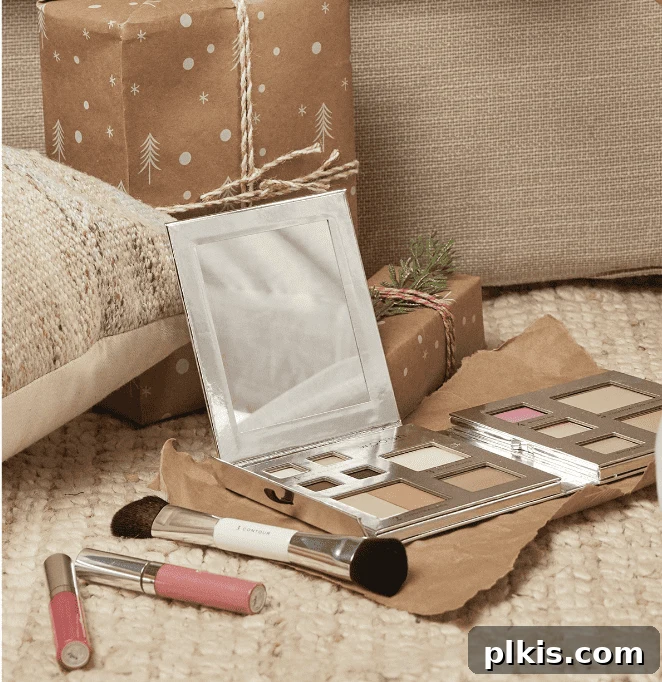Holiday Gifting Unwrapped Your Essential Picks 13 A display of various Woosh Beauty Makeup products, including palettes and brushes, arranged on a light surface.