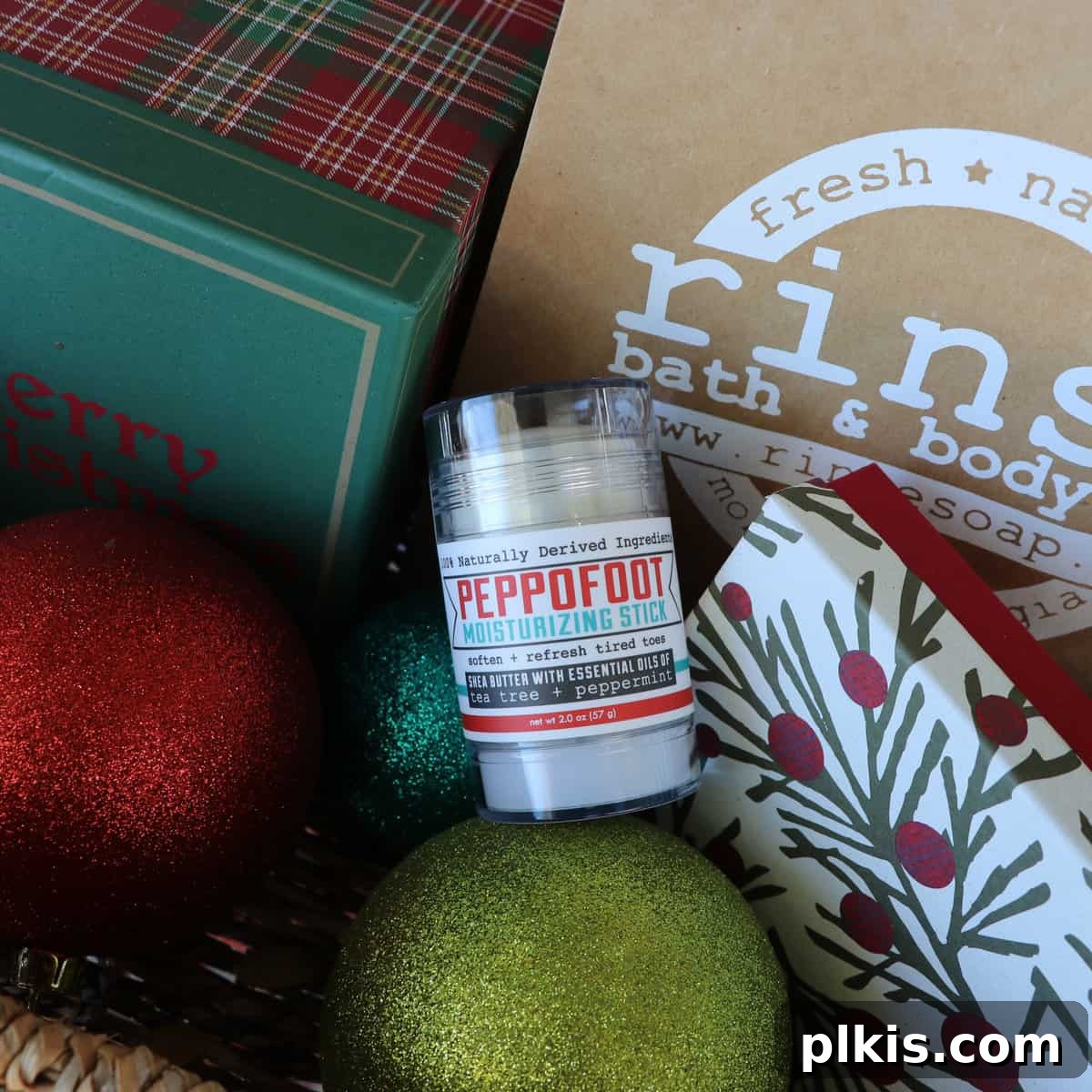 Holiday Gifting Unwrapped Your Essential Picks 14 Close-up of a festive Rinse Bath & Body Co. soap product amidst Christmas decorations.