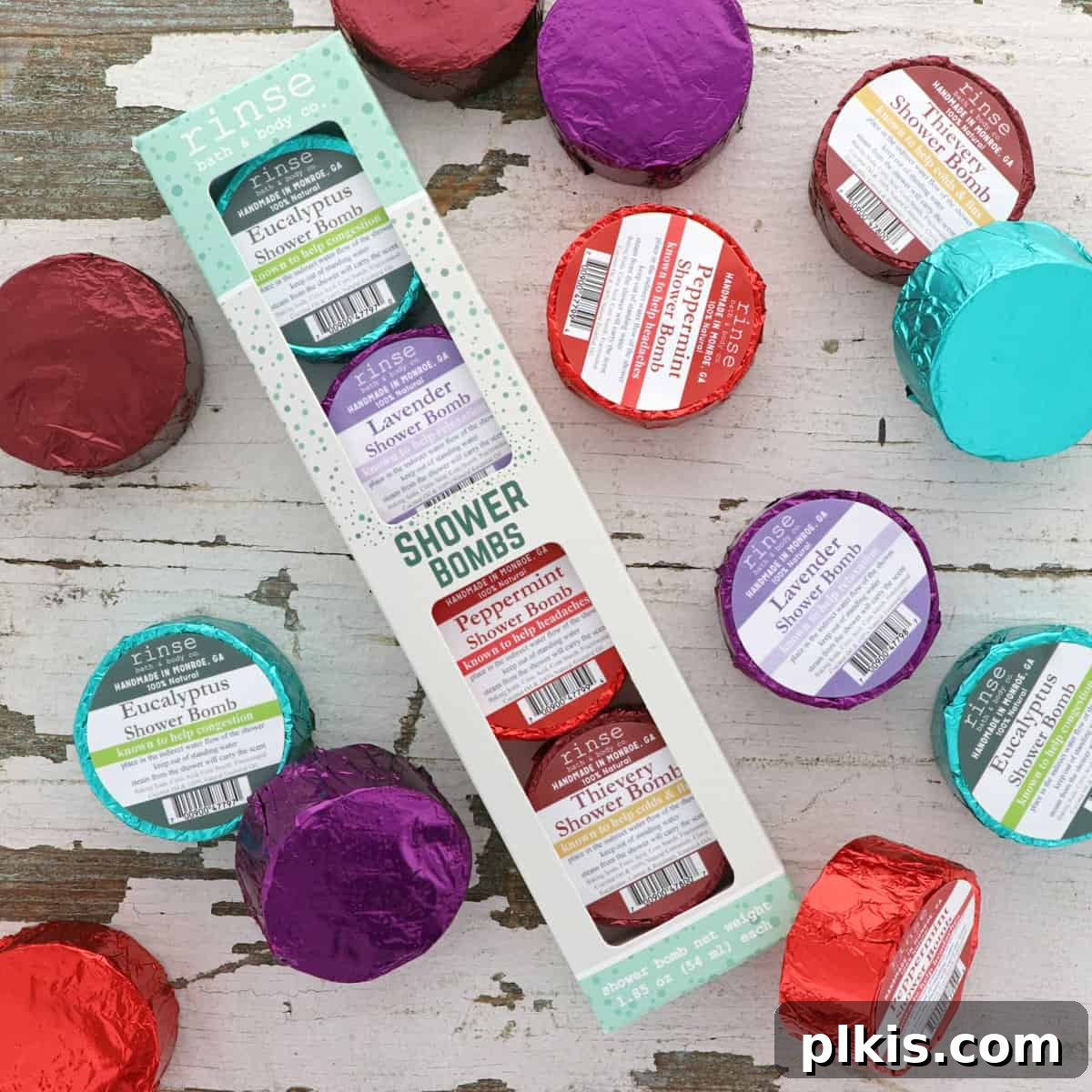 Holiday Gifting Unwrapped Your Essential Picks 16 An array of various Rinse Bath & Body Co. products neatly laid out on a clean white surface.