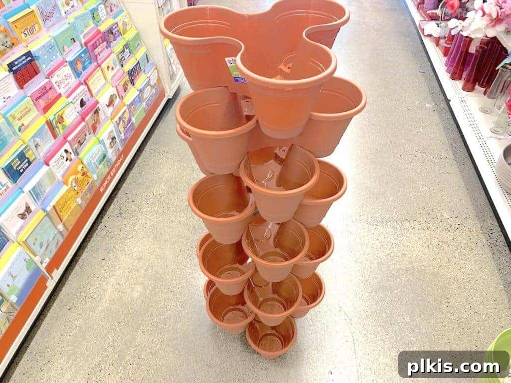 Sprouting Savings: Dollar Tree Garden Essentials 8 Stacked empty flower pots forming a vertical garden display.
