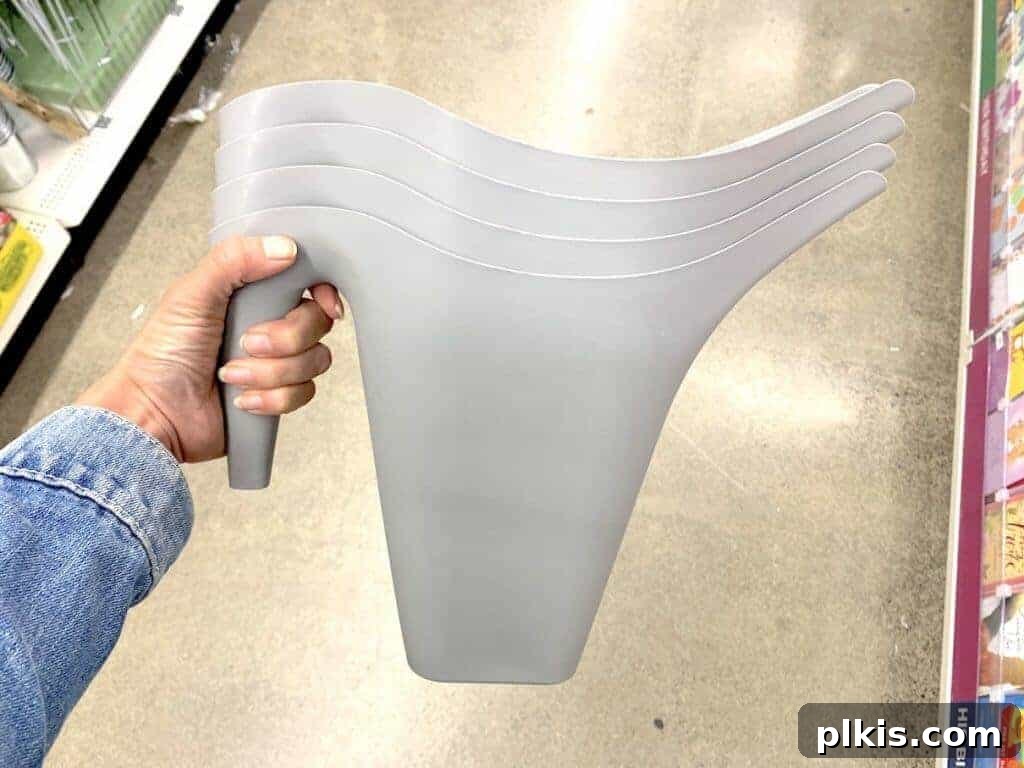 Sprouting Savings: Dollar Tree Garden Essentials 10 Stack of flexible plastic watering cans available at Dollar Tree.