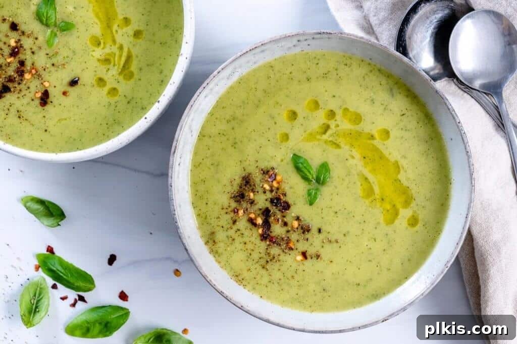 23 Soul-Soothing Vegan Soup Recipes 9 completed soup in a white bowl against a white background