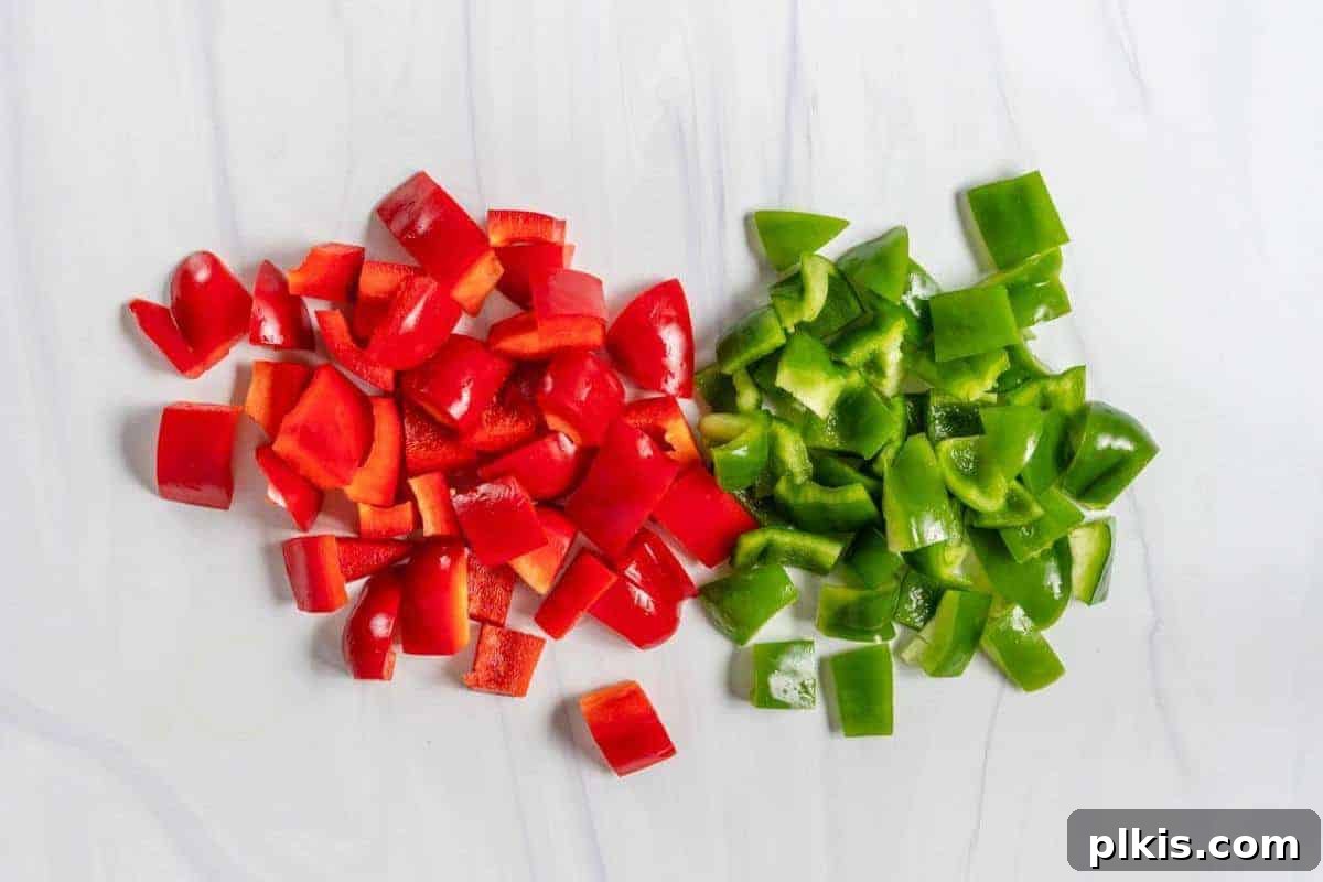 The Basics of Cutting Chopped Red and Green Bell Pepper on a Marble Surface