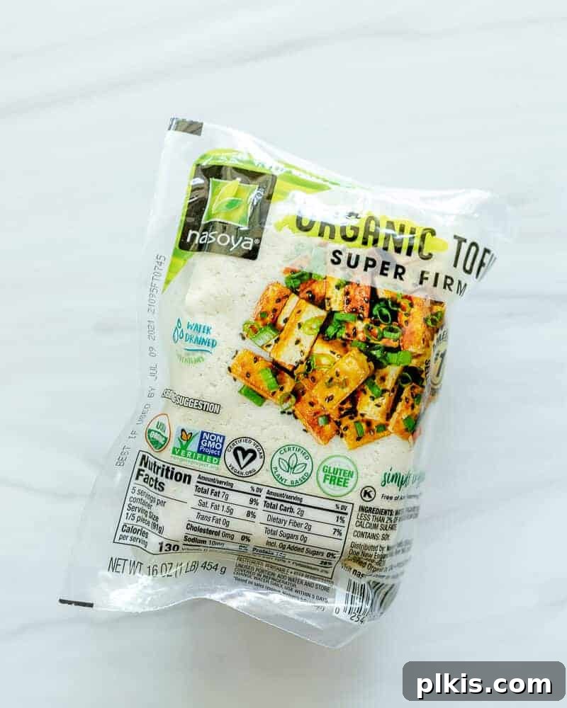 Ultimate Tofu Guide four different packaged tofu blocks on a white background