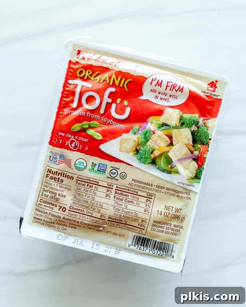Ultimate Tofu Guide four different packaged tofu blocks on a white background