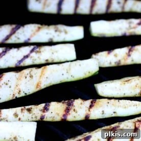 Delicious grilled zucchini slices, marinated and ready to be served.