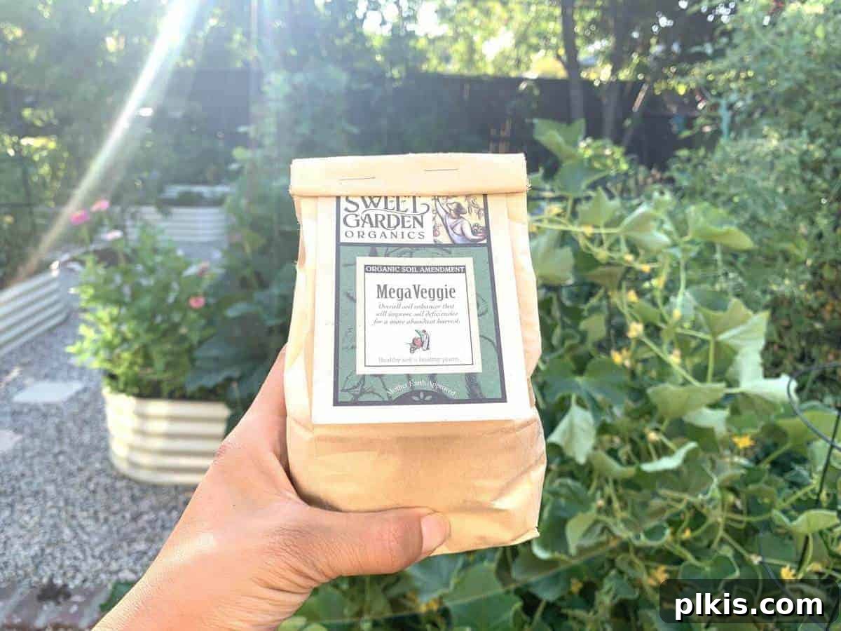 Sweet Garden Vegan Fertilizer one brown bag of vegan fertilizer with a green leafy background