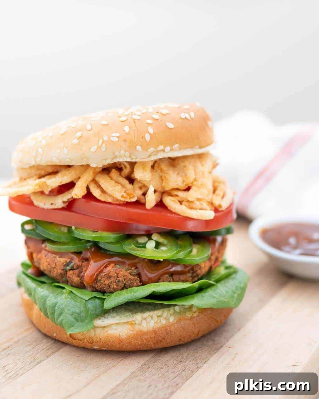 Spicy Red Bean Burger spicy red bean burger on wooden surface with white background