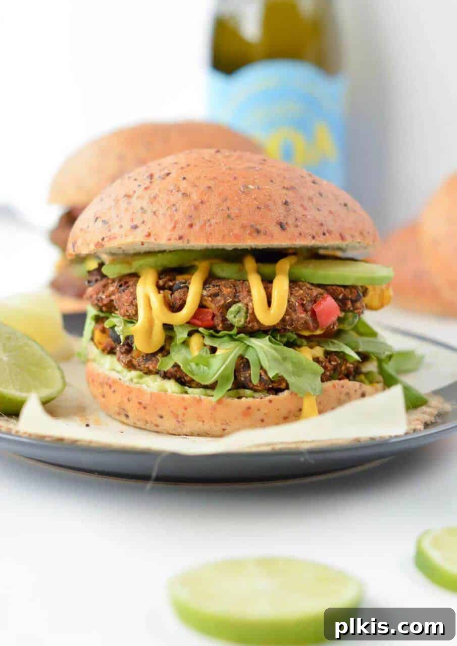 Vegan Spicy Black Bean Burger with Sweet Potato burger on a white plate in a white background