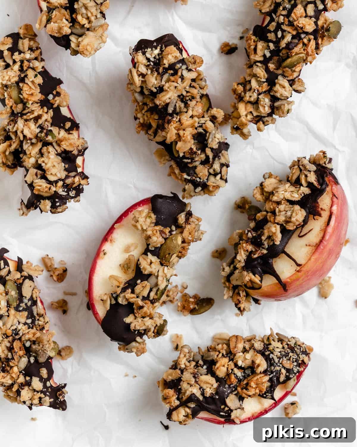 48 Irresistible Vegan Apple Delights 9 several completed Healthy Apple Snacks with Granola against a white surface