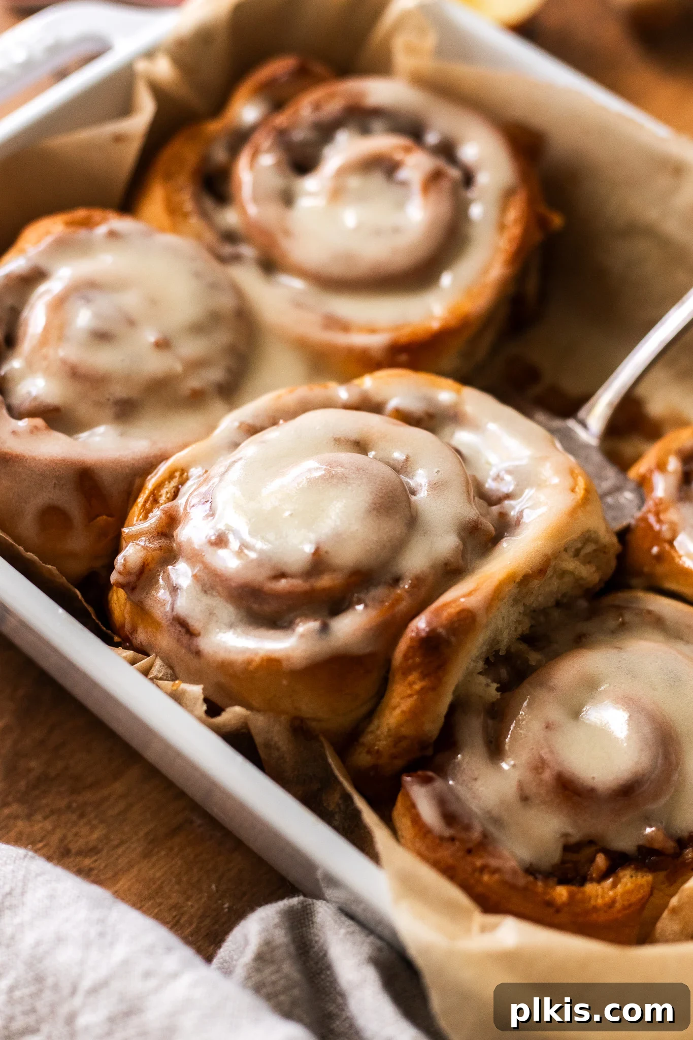 48 Irresistible Vegan Apple Delights 11 Completed Apple Pie Cinnamon Rolls in a baking tray.