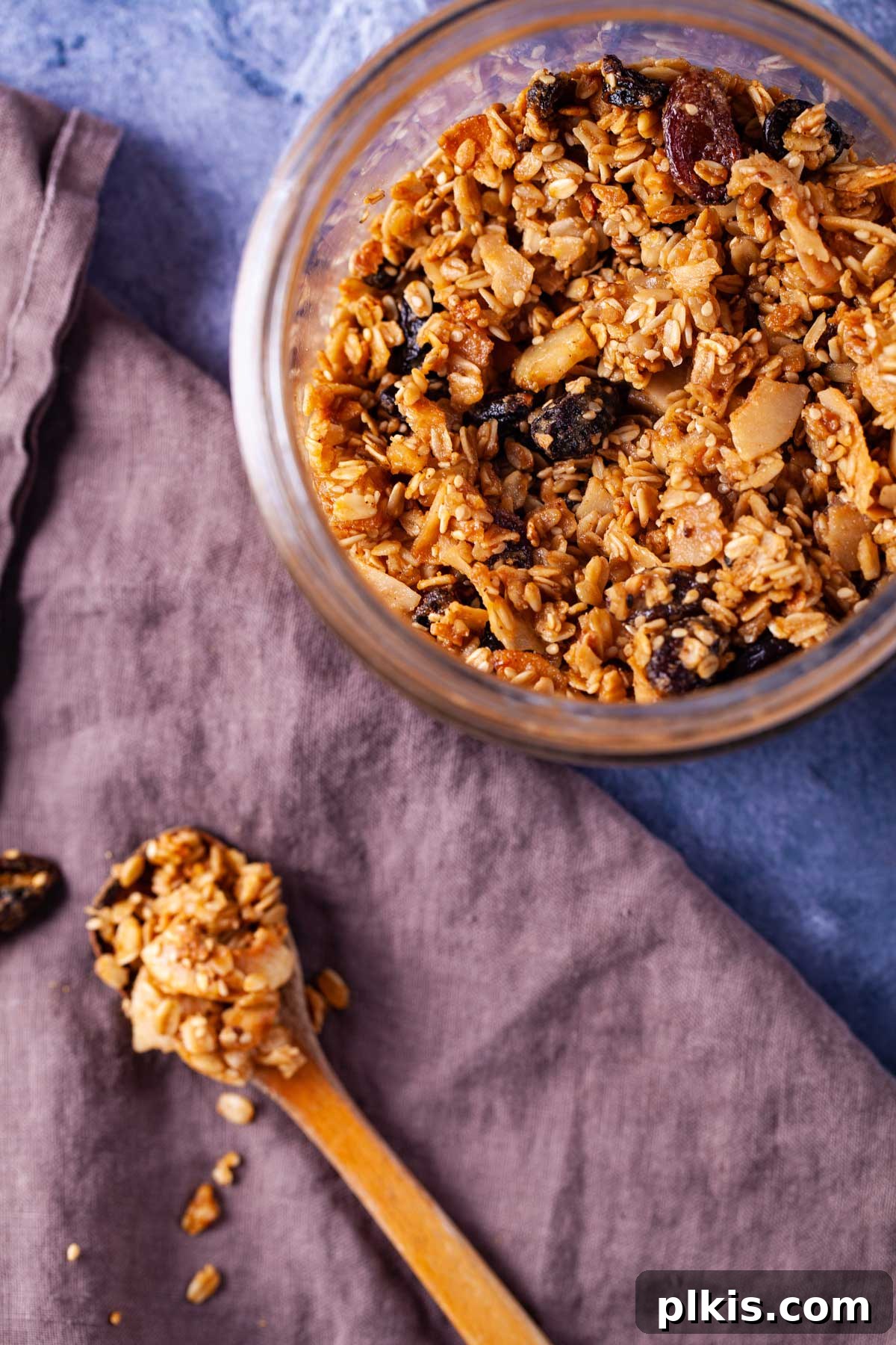 48 Irresistible Vegan Apple Delights 4 Completed Nut Free Granola in a spoon and bowl.