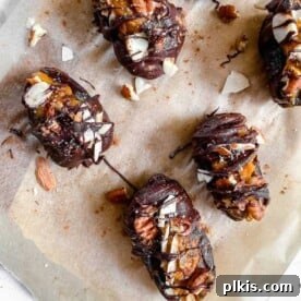 A smaller image of the Pumpkin Stuffed Dates Recipe, showcasing the delicious chocolate coating and nutty toppings.